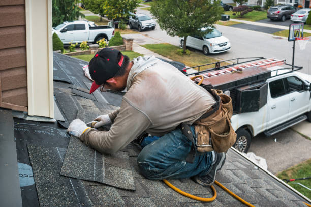 Professional Roofing technician working in Durham, NC